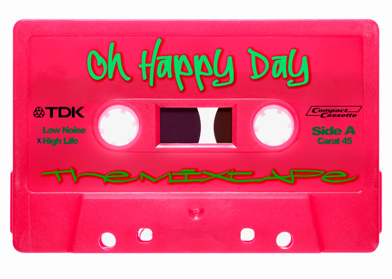 A pink cassette tape with the text "Oh Happy Day" in green and additional text in black.